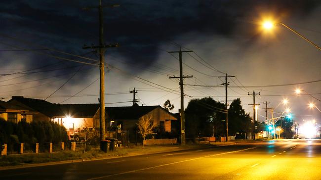 Toxic smoke swirls over Barry Rd in Dallas. Picture: Ian Currie