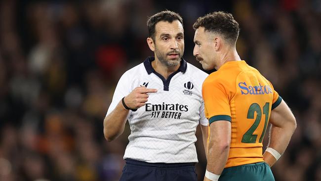 Referee Mathieu Raynal speaks to Nic White of the Wallabies during The Rugby Championship &amp; Bledisloe Cup match between the Australia Wallabies and the New Zealand All Blacks. Picture: Cameron Spencer/Getty Images