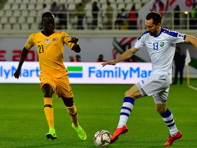 The Socceroos battle Uzbekistan at the last Asian Cup. Picture: Giuseppe Cacace/AFP