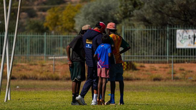 Melbourne Demons players Shane McAdam and Andy Moniz-Wakefield went to Santa Teresa ahead of the 2025 AFL game in Alice Springs. Picture: Melbourne Demons