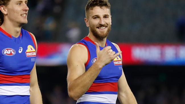 MELBOURNE, AUSTRALIA - MAY 22: Aaron Naughton (left) and Marcus Bontempelli of the Bulldogs celebrate during the 2021 AFL Round 10 match between the Western Bulldogs and the St Kilda Saints at Marvel Stadium on May 22, 2021 in Melbourne, Australia. (Photo by Michael Willson/AFL Photos via Getty Images)