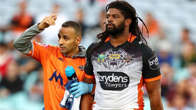 Jamal Idris goes off for a concussion test against the Dragons. Picture: Gregg Porteous