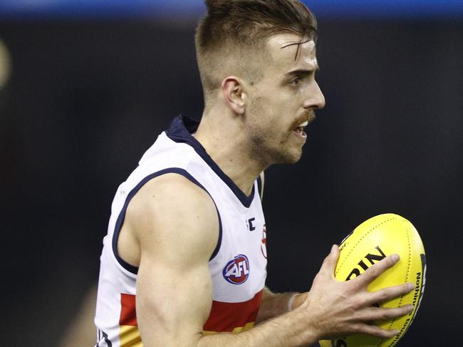 Jordan Gallucci of the Crows runs with the ball during the Round 23 AFL match between the Carlton Blues and the Adelaide Crows at Etihad Stadium in Melbourne, Saturday, August 25, 2018. (AAP Image/Daniel Pockett) NO ARCHIVING, EDITORIAL USE ONLY