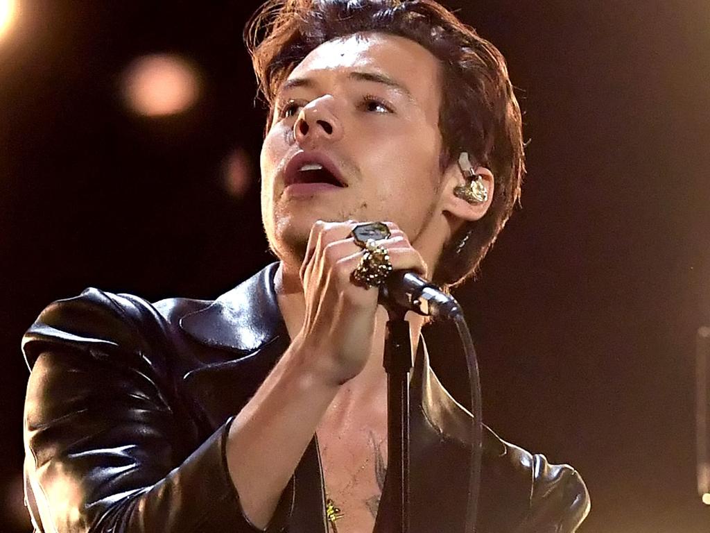 In this handout photo courtesy of The Recording Academy, British singer Harry Styles performs during the 63rd Annual Grammy Awards Ceremony broadcast live from the Staples Center in Los Angeles on March 14, 2021. (Photo by Kevin Winter / The Recording Academy / AFP) / RESTRICTED TO EDITORIAL USE - MANDATORY CREDIT "AFP PHOTO / Kevin WINTER / The Recording Academy via Getty Images" - NO MARKETING - NO ADVERTISING CAMPAIGNS - DISTRIBUTED AS A SERVICE TO CLIENTS