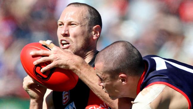 Ryan Ferguson is tackled by Jaryd Cachia.