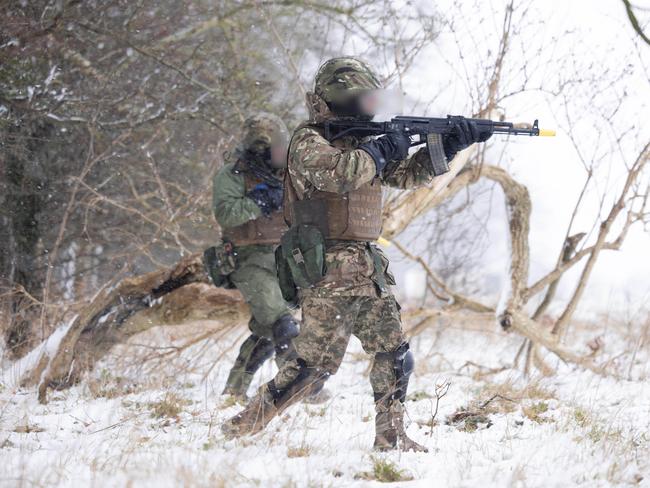 Ukrainian trainees perform a section attack during a field phase of Operation Kudu which will now see 90 ADF trainers deployed to the UK. Picture: Defence