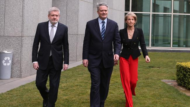 Mitch Fifield, Mathias Cormann and Michaelia Cash approach a press conference which expedited the spill at Parliament House on Thursday.