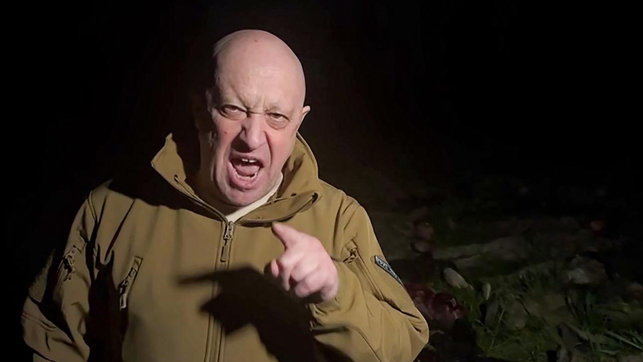 Wagner mercenary chief Yevgeny Prigozhin addresses the Russian army’s top brass standing in front of bodies he presented as fallen Wagner fighters at an undisclosed location. Picture: Concord/AFP