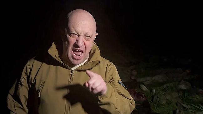 Wagner mercenary chief Yevgeny Prigozhin addresses the Russian army’s top brass standing in front of bodies he presented as fallen Wagner fighters at an undisclosed location. Picture: Concord/AFP