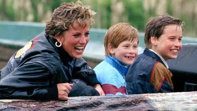 Prince William and Prince Harry as children with their late mother Princess Diana. Picture: Julian Parker/Getty Images