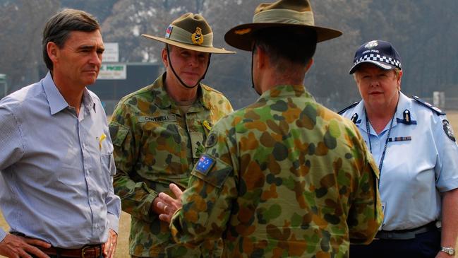 John Brumby (left) called a royal commission following Black Saturday, which is responsible for great change such as the “leave and live” message.