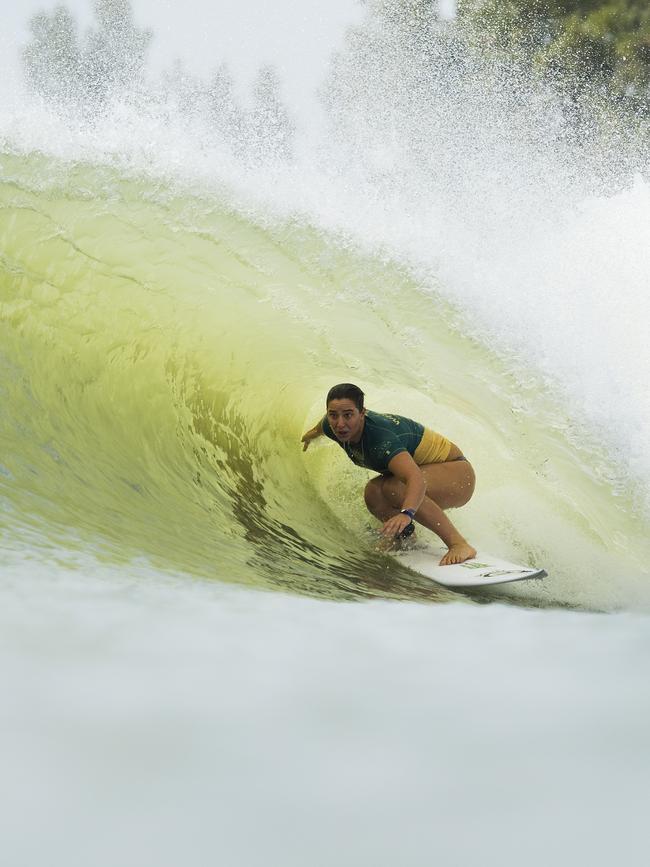 Tyler Wright surfing for Australia in a wave pool.