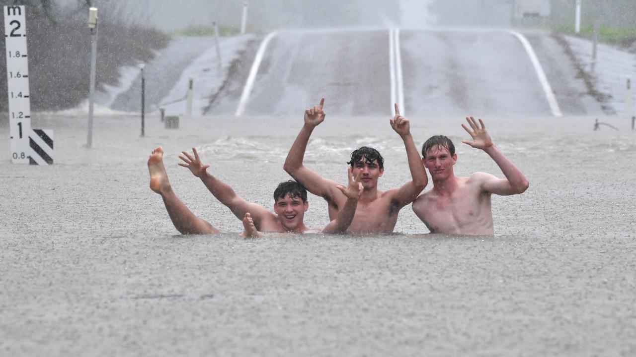 Wet weather in Townsville. Road closed at Allambie Lane, Kelso. Aston Smith, Mitchell Maher and Riley McIntyre. Picture: Evan Morgan