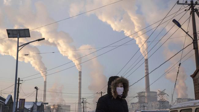 Despite producing nearly a third of the world's total carbon dioxide emissions, China is financially rewarded by the UN climate summit. Picture: Kevin Frayer/Getty Images