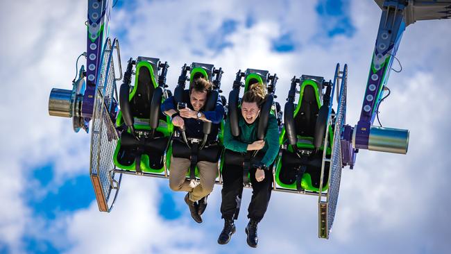 New ride at the Ekka. Courier Mail journalists Andreas Nicola and Taylah Fellows tries out The Joker ride which is a new ride to feature at this years Ekka. Picture: Nigel Hallett