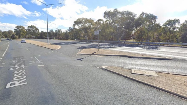 Police allege the boy crashed the stolen car at the intersection of Southern Cross Dr and Ross Smith Cres (pictured) in Scullin on Tuesday night. Picture: Google Streetview.