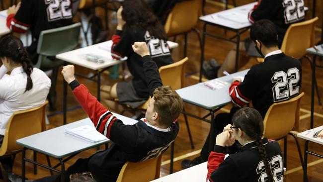 Students wait to start a year 12 exam. Picture: Jonathan Ng