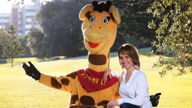 Sloane is currently CEO of Life Education, and is pictured with the organisation’s mascot Healthy Harold. Picture: Toby Zerna