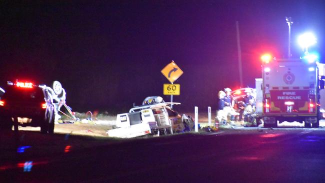 Fatal crash scene on Eton Homebush Rd near Eton. Two cars collided shortly before 6pm. A person, belileved to be a woman, was trapped in one of the vehicles. Picture: Tara Miko