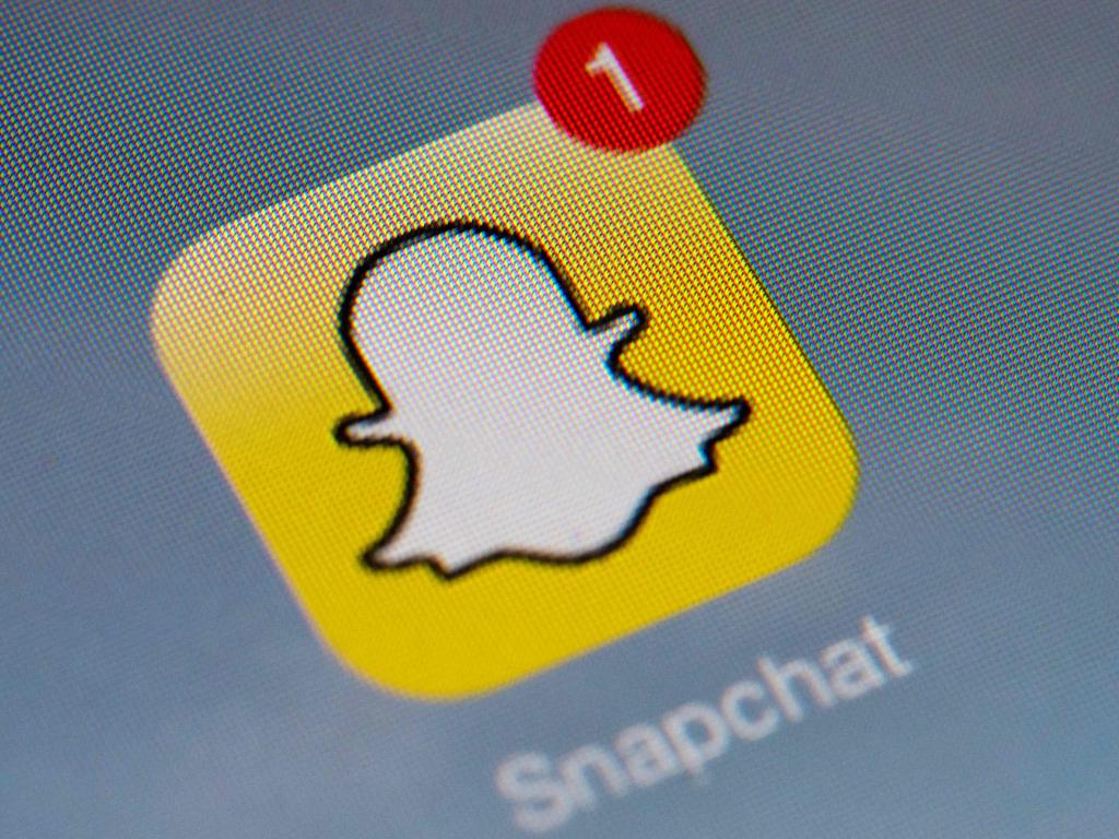 The mum upgraded her daughter’s Snapchat account to a premium service to try to lose the bot, but had no luck. Picture: Lionel Bonaventure / AFP