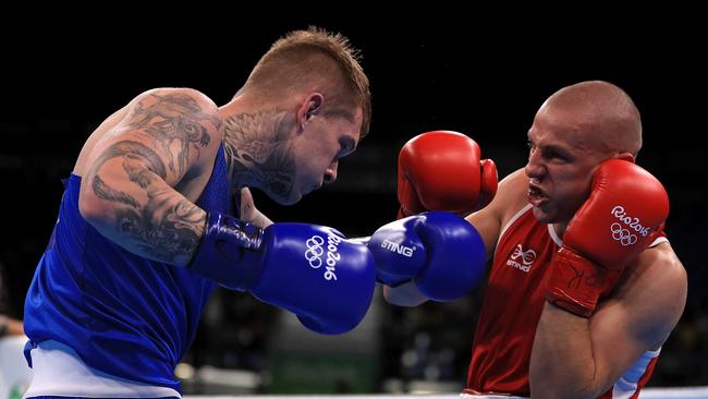 Daniel Lewis (Blue) defeated Tomasz Jablonski of Poland (Red) at the Rio Olympic Games. Picture: Mike Ehrmann/Getty Images