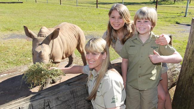 Terri, Bindi and Robert annoucing they have a new baby rhino and one of their giraffe's is pregnant. Picture: Brett Wortman / Sunshine Coast Daily