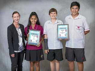 BE SMART: Minister for Justice Yvette D'Ath with Buy Smart Competition award recipients Drishti (Toolooa State High School), Sebastian Hurcum and Zion Cordero (Trinity College). Picture: Waddington Photography