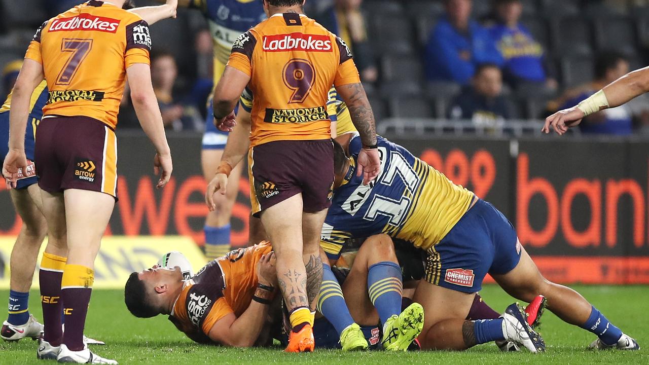 David Fifita of the Broncos is injured in a tackle that saw Parramatta’s Junior Paulo placed on report.