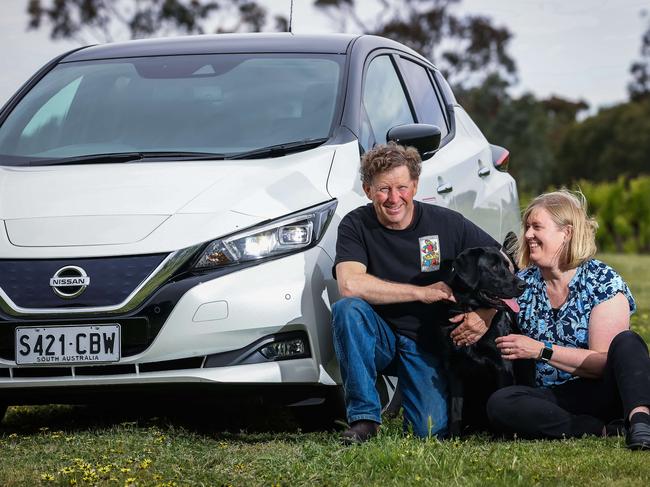 Winery owner Joseph Evans has been waiting to hook his Nissan Leaf up to his home for two years, pictured with wife Sue and dog Tama, at Ballycroft Vineyard and Cellars in Greenock. Picture: Tom Huntley