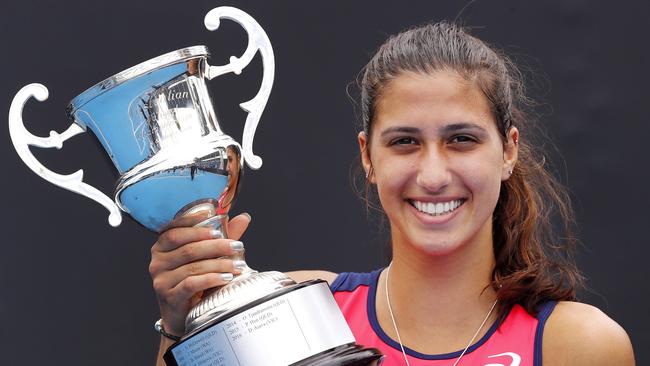 Jaimee Fourlis with the spoils of her three-set victory over Destanee Aiava. Pic: Michael Klein