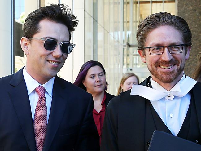 Journalist Joe Aston leaving Federal court  with his lawyer in the defamation trial against Elaine Stead. Jane Dempster/The Australian.