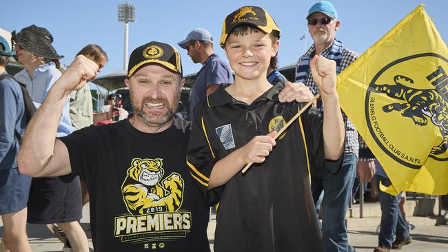 Matthew Hancock, 46, with his son, Austin Hancock, 11 at the SANFL grand final at Adelaide Oval. Picture: Matt Loxton