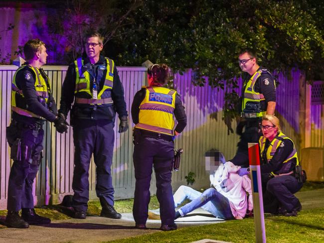 Police with a youth in custody during a Herald Sun ridealong. Picture: Valeriu Campan