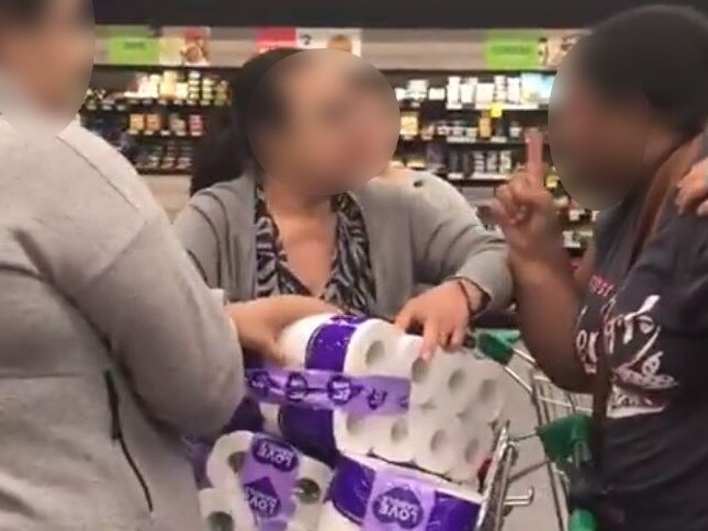 Shoppers fight over toilet rolls in Woolworths Chullora as the coronavirus craziness hits new levels. Picture Twitter