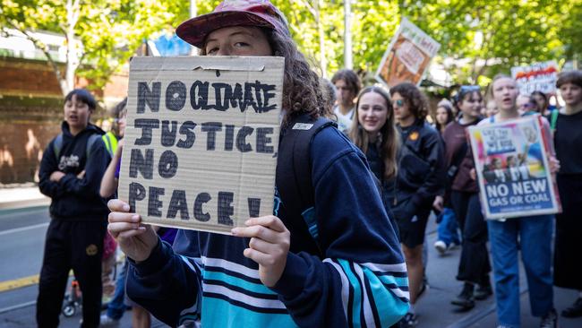 Youth march through the streets. Picture: Mark Stewart