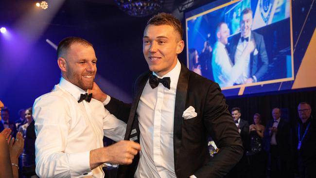 Sam Docherty congratulates Patrick Cripps. Picture: Mark Stewart