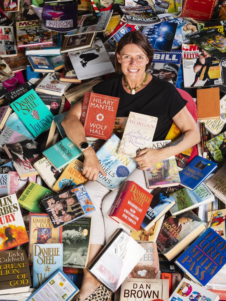 Lifeline Darling Downs and South West Queensland acting CEO Rachelle Patterson checks out just some of the books on offer at The Chronicle Lifeline Bookfest, Wednesday, March 1, 2023. Picture: Kevin Farmer