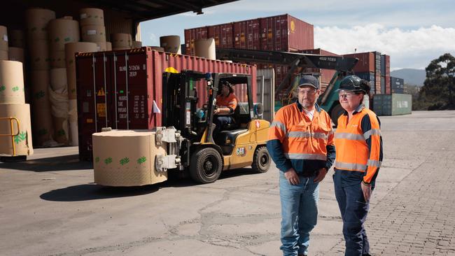 Nigel Hay, warehouse manager at Tasmanian paper mill Norske Skog, with staff member Claire Glover, at the mill which is facing challenges due to shipping surcharges. Picture: Peter Mathew