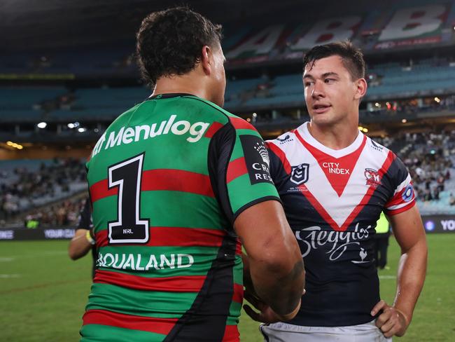 SYDNEY, AUSTRALIA - MARCH 25: Latrell Mitchell of the Rabbitohs and Joseph Manu of the Roosters shakes hand after the round three NRL match between the South Sydney Rabbitohs and the Sydney Roosters at Accor Stadium, on March 25, 2022, in Sydney, Australia. (Photo by Matt King/Getty Images)