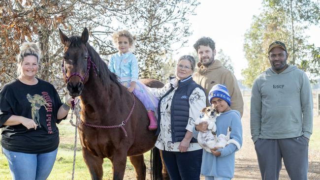 Danni, Spud the Standardbred horse with Lani, Jeannine, Son Kane, grandson Noah with jack russell Breno and Joji. Picture: Zoe Phillips