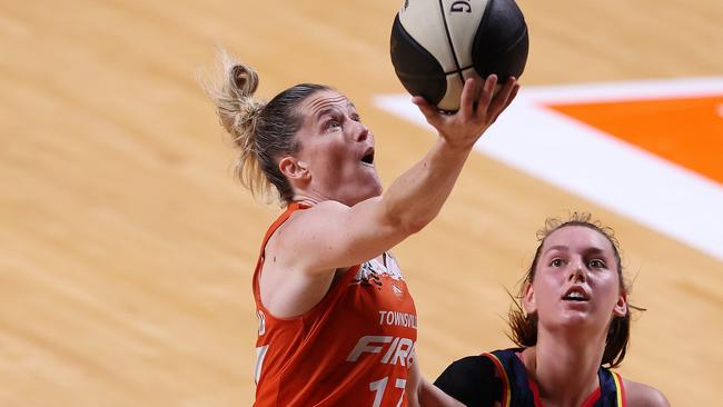 ADELAIDE, AUSTRALIA - NOVEMBER 23: Sami Whitcomb of the Townsville Fire and Isobel Borlase of the Adelaide Lightning during the WNBL match between Adelaide Lightning and Townsville Fire at Adelaide Arena, on November 23, 2023, in Adelaide, Australia. (Photo by Sarah Reed/Getty Images)