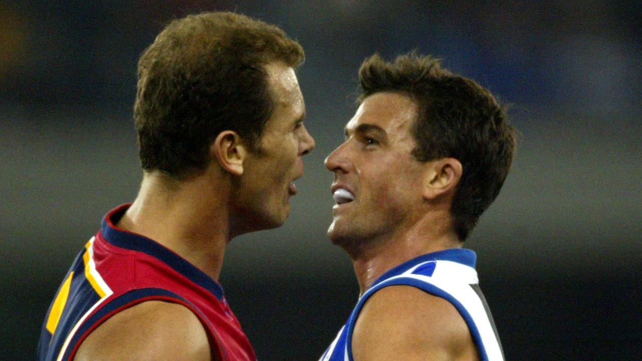 MAY 2, 2003: Wayne Carey (L) and Anthony Stevens clash during North Melbourne Kangaroos v Adelaide Crows at the Telstra Dome in Melbourne, 02/05/03. Pic George Sal. Australian Rules