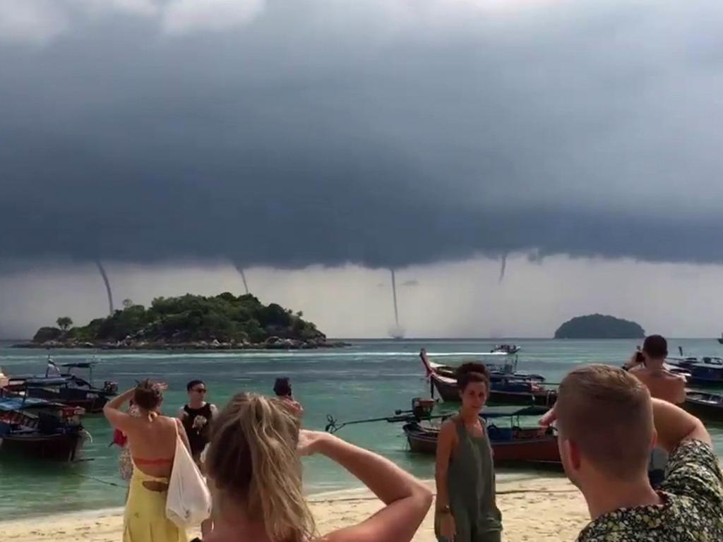 Incredible footage shows the moment a rare QUADRUPLE waterspout stunned tourists on a remote Thai holiday island. Picture: supplied