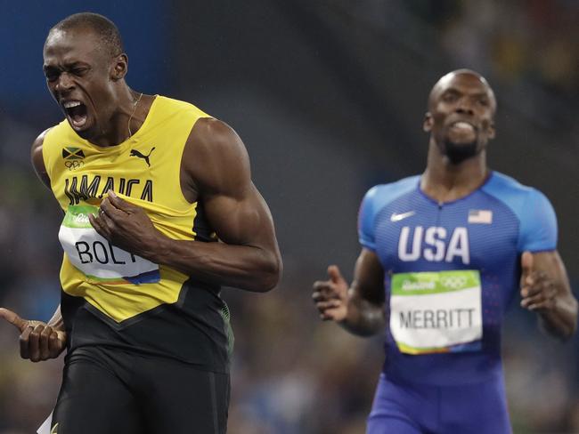 Usain Bolt roars in jubilation after winning the men's 200-meter final in Rio.