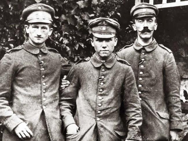 Adolf Hitler (right) as a young corporal