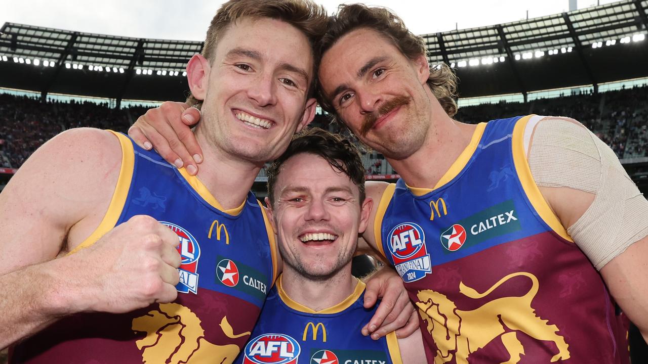 MELBOURNE , AUSTRALIA. September 28, 2024. AFL Grand Final between the Brisbane Lions and Sydney Swans at the MCG. Winning Brisbane Lions players Harris Andrews, Lachie Neale and Joe Daniher. Picture: David Caird