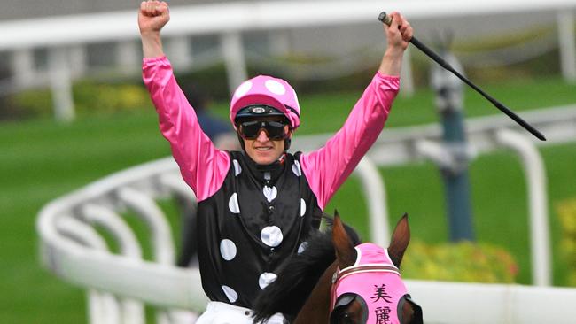 Zac Purton salutes after riding his 1000th winner. Picture: Getty