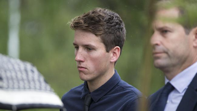 Nicholas Parker (19) pictured (left) leaving Windsor Court on February 6. He is charged over a crash which killed two cyclists in Richmond in December 2019. Picture: Damian Shaw