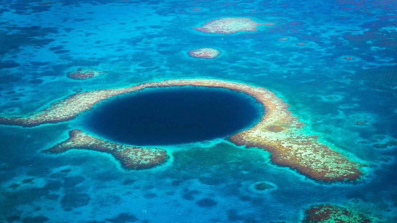 The famous diving site and natural phenomenon the Blue Hole in Belize. Picture: iStock