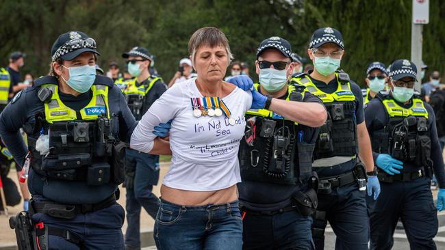 Police officers arrested several people throughout the afternoon. Picture: Jake Nowakowski